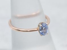 Crafted of warm rose gold, this solitaire mounting required one of our sweetest stones to complete it. We chose a light periwinkle-hued sapphire that has such sparkle and lovely color that it requires nothing in the way of accent to make it luxurious.Metal: 14K Rose and White GoldGem: Sapphire .70 CaratsGem Measurements: 4.2 x 5.9 mm, OvalRing Size: 6.75Marks: "14K" Stamped on the inside band Light Sapphire Engagement Ring, Light Blue Sapphire Engagement Ring, Light Periwinkle, White Gold Sapphire Ring, Light Blue Sapphire, Blue Sapphire Engagement Ring, Sapphire Solitaire Ring, Gold Sapphire Ring, Light Sapphire