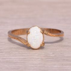 This Stunning Piece, Known As The Italian Opal, Features An Enchanting Oval-Shaped Australian Opal That Shimmers With A Mesmerizing Play Of Colors. The Opal Is Elegantly Set In Warm Yellow Gold, Enhancing The Opal’s Natural Beauty With A Classic And Refined Design. This Ring, Crafted With Precision In Italy, Exemplifies Both Craftsmanship And Timeless Elegance. The Ring Is Crafted In Yellow Gold And Is Currently A Finger Size 6 Yet Can Be Adjusted To Any Finger Size For An Additional Charge Upon Request, Ensuring A Perfect Fit. Opal Gold Ring, Australian Opal Ring, Opal Ring Gold, Australian Opal, Opal Rings, Yellow White, Womens Jewelry Rings, Timeless Elegance, Gold Color