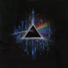 the dark side of the moon with paint splattered on it and rainbow in the background