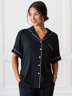 Bedtime can’t come soon enough when you’re waiting to slip into the soon-to-be star of your sleep routine, our Short Sleeve & Pant Pajama Set. Stretch-knit bamboo viscose prevents night sweats with a drapey silhouette that resists bunching (no wonder it made Oprah's favorite things list!). Includes a pocketed button-up and drawstring pants with elegant contrast piping throughout. Slips For Women, Bamboo Pants, Classic Pajamas, Bamboo Pajamas, Best Pajamas, Short Sleeve Shirt Women, Fabric Accessories, Soft Clothes, Pajama Top