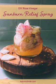 a jar filled with sunburn relief spray sitting on top of a wooden board