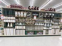 a store display filled with lots of white and green items