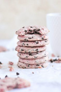 raspberry chocolate chip cookies stacked on top of each other with text overlay