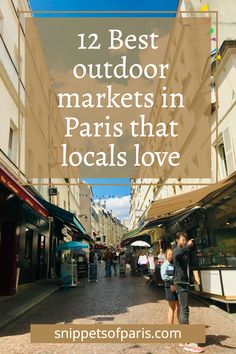 people walking down the street in paris with text overlay that reads 12 best outdoor markets in paris that locals love