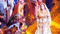 the bride and groom are surrounded by confetti