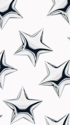 many shiny stars on a white background with black and white lines in the shape of an inverted star