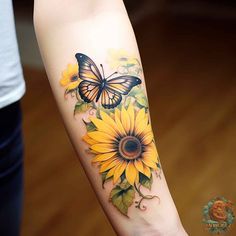 a sunflower and butterfly tattoo on the arm