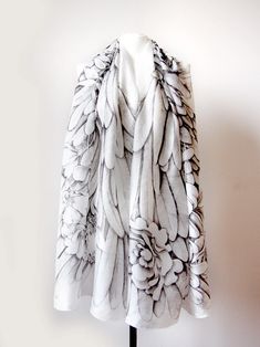 Angel Wings silk scarf is a big scarf, a pareo or a sarong (beach wrap) made of natural silk by the process of hand drawing. This silk scarf XL is decorated with a design of feathers arranged in a shape of wings with flowers. This XL scarves is made of natural silk type Habotai Medium, which is almost non transparent, glossy and rich. It will require gentle hand - washing and ironing on the lowest temperature set. This Wings scarf was originally drawn for a lovely lady, who asked me for the bigg Elegant White Silk Scarf For Beach, White Silk Scarf Shawl, White Silk Shawl Scarf, White Silk Shawl Scarf For Summer, White Shawl Scarf For Summer, Artistic White Silk Scarves, White Silk Shawl Scarf For Spring, White Bohemian Silk Scarves, White Silk Bohemian Scarves