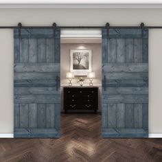 an open door leading to a bedroom with wood flooring and blue painted shutters