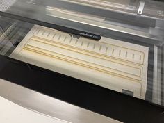 a display case with some bread in it