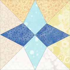 a blue and yellow patchwork design on a piece of paper that looks like an origami