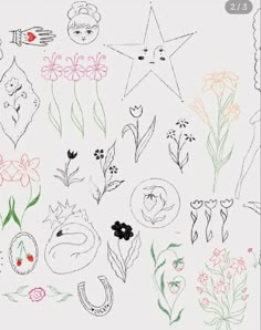 a drawing of flowers and stars on a white paper