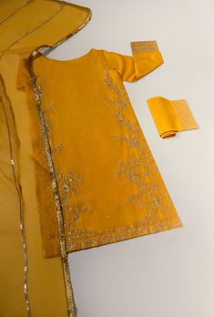 Adorned on pure raw silk 58 Gms, in a deep mustard yellow hue heavily embellished with gold zari, dabka, sequins and crystals. The length of the long kameez is 46 inches. Accompanied with gotah trousers and pure organza matching dupatta featuring gold gotah with Kiran lace. Order Duration: 4 to 6 weeks Long Kameez, Loafer Shoes Women, Raw Silk, Shoes Women, Mustard Yellow, Loafer Shoes, Mustard, Trousers, Women Shoes