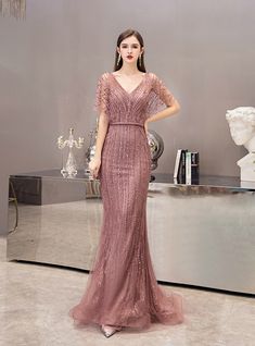 Silhouette:mermaidHemline:floor lengthNeckline:v-neckFabric:tulleShown Color:pinkSleeve Style:bat sleeveBack Style:zipper upEmbellishment:beading sequinsBuilt-in Bra: yes Dress Wisuda, Gaun Tulle, Dress Brokat Modern, Model Dress Kebaya, Evening Dress Beaded, Purple Evening Dress, Beaded Evening Gowns, Dress Pesta, Dress Kebaya