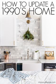 a kitchen with marble counter tops and white cabinets, the title reads how to update a 1900's home