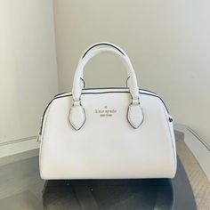 Nwt Kate Spade Kf493 Madison Leather Small Duffle Satchel Crossbody Bag Meringue Product Details Measurements 9.06" D Strap Drop: 3.15" Handle Drop: 3.25" Features Strap Drop: 22 Metal Pinmount Logo Closure Type: Top Zip Closure Dust Bag Included: No Back Zip Pocket Materials Saffiano Leather Lining: Two Way Script Logo Lining Imported Style Number Kf493 Kate Spade Handbags White, White Kate Spade Bag With Zipper Closure, Classic White Handheld Bag, White Formal Shoulder Bag With Zipper Closure, Formal White Shoulder Bag With Zipper Closure, Luxury White Satchel With Zipper Closure, White Crossbody Office Bag, White Evening Bag With Zipper Closure, White Office Crossbody Bag