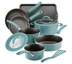 an assortment of pots and pans with utensils