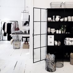 a room filled with lots of white and black items