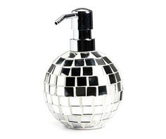 a soap dispenser with black and white tiles on it's body