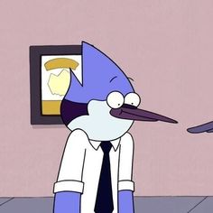 a man in a suit and tie standing next to a cartoon character wearing a bird's head