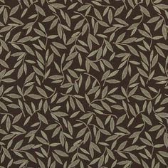 a brown and white pattern with leaves in the middle, on a dark background that looks like it has been made out of fabric