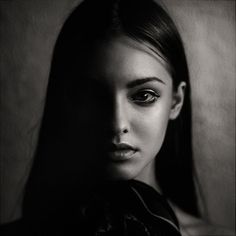 a black and white photo of a woman's face