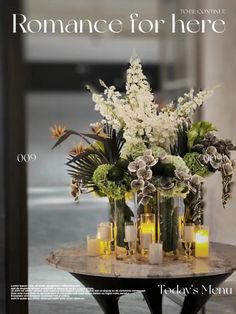 a magazine cover with flowers and candles on a table in front of a window that reads romance for here