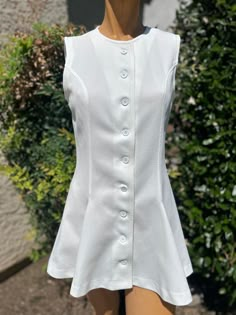 Here is a vintage 1970s Polyester Tennis Dress.Made by Head.Following are the measurements. Bust 34",Waist 30",Hips full,Length measured from top of shoulder to hem 28".Buttons up the front.White polyester fabric.Full pleated skirt.In very nice vintage condition. Please take special consideration of measurements. 1970 sizing was much smaller than today's standards. Take extra special note of length. Tennis dresss were very short not like a regular dress.If you live overseas please email me first before purchasing for mailing cost. Price quoted is for USA only Vintage Tennis Dress, 70s Mode, White Tennis Dress, Tennis Wear, 60s And 70s Fashion, Vintage Tennis, Golf Dresses, Womens Sports, Grad Dresses