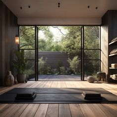 there is a yoga mat on the floor in front of an open glass door that leads to a garden