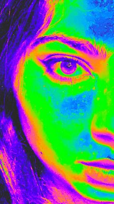 a woman's face is shown in an image that appears to be multicolored