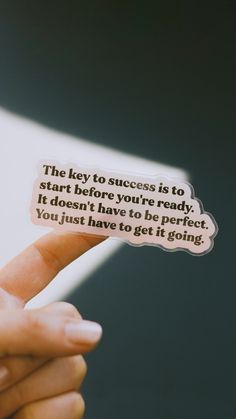 someone is pointing to the text on their sticker that says,'the key to success is to start before you're ready it doesn't have to be perfect