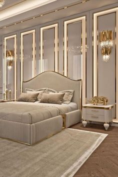 a large bed sitting in the middle of a bedroom next to a chandelier