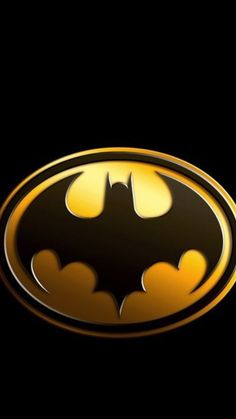 the batman symbol is shown in gold and black on a black background, with yellow highlights