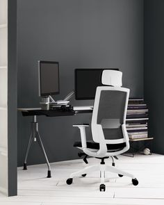 an office chair sitting in front of a computer desk