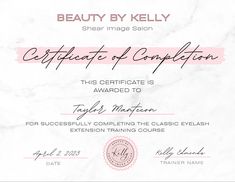 a certificate is being displayed on a white marble background with the words, beauty by kelly