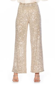 Sparkling sequins bring dazzling allure to a pair of stretch pants that are elevated by a wide leg and mid rise. Banded waist Invisible back zipper 90% polyester, 10% spandex; lining content: 100% polyester Hand wash cold, lay flat to dry Imported Model stats: 5'10", 32" bust, 25" waist, 36" hip. Model is wearing size X-Small. Sequence Pants, Black Sequin Pants, Alexia Admor, Clothes For Women Over 50, Sequin Pants, Sequin Fabric, Wide Legs, Stretch Pants, Black Sequins