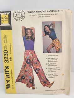 This is a vintage pattern from the 1970s. It is a dress sewing pattern. It is for a size small and fits up to a 25 inch waist. The description reads: This wrap around pants skirt in two lengths, has elastic in casing hooked in back, and self fabric drawstring in casing.  The pattern is uncut, comes with complete instructions, and the original envelope. Simple Wrap Skirt Pattern, Pantalon Thai, Women Pants Pattern, Wrap Skirt Pattern, Thai Fisherman Pants, 1970s Sewing Patterns, Easy Wrap, Fisherman Pants, Wrap Shorts