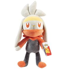 the stuffed animal is wearing an orange and gray outfit with ears, eyes, and tail