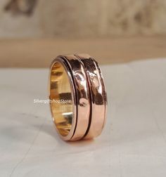 Pure Copper Ring, Copper Spinner Ring, Hammered Copper Ring, Men And Women Ring, Thumb Ring, Meditation Ring, Fidget Ring, Copper Band Ring. Handmade Ring Material:   Copper  Theme: Love & Friendship Category: Spinner :- Free Shipping :- You are always special for us. :- Shipping time is 1-3 days.  FEEDBACK We Always Believe In Customer Satisfaction, Your Feedback Is Very Important & Valuable For A Successful , So Please Drop A Feedback If You Are Liking Or Disliking Our Product. OR What Changes Bronze Rings Fidget, Unique Gold-colored Copper Rings, Adjustable Copper Nickel-free Rings, Prayer Ring, Meditation Ring, Meditation Prayer, Fidget Rings, Meditation Rings, Unusual Rings