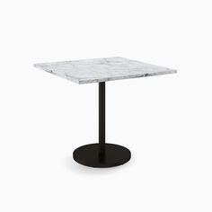 a white marble table with black base on an isolated background, viewed from the front