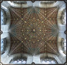 an ornate ceiling in the middle of a building