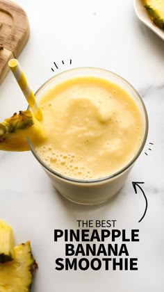 the best pineapple banana smoothie is in a glass with a straw sticking out of it