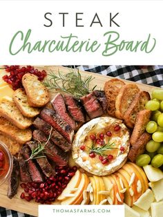 steak charcuterie board with grapes and bread