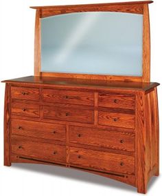 a wooden dresser with a large mirror on it's top and bottom drawer below