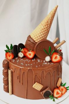 a chocolate cake topped with strawberries and ice cream