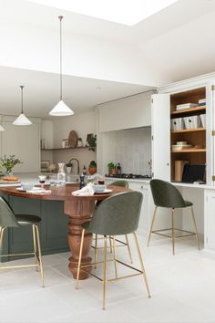 the kitchen is clean and ready to be used as a dining room or office area