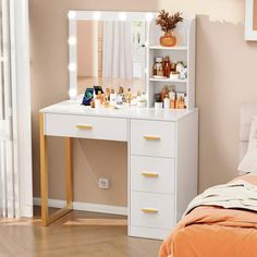 a white vanity with lights on it in a bedroom