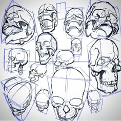 a bunch of skulls that are drawn in blue ink on a white paper with the words,