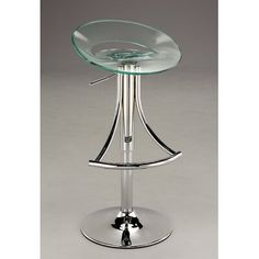 a clear glass and chrome bar stool with an adjustable foot rest on a metal base