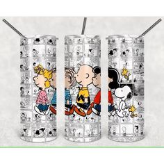 three cans with cartoon characters on them, one has a straw in it and the other has